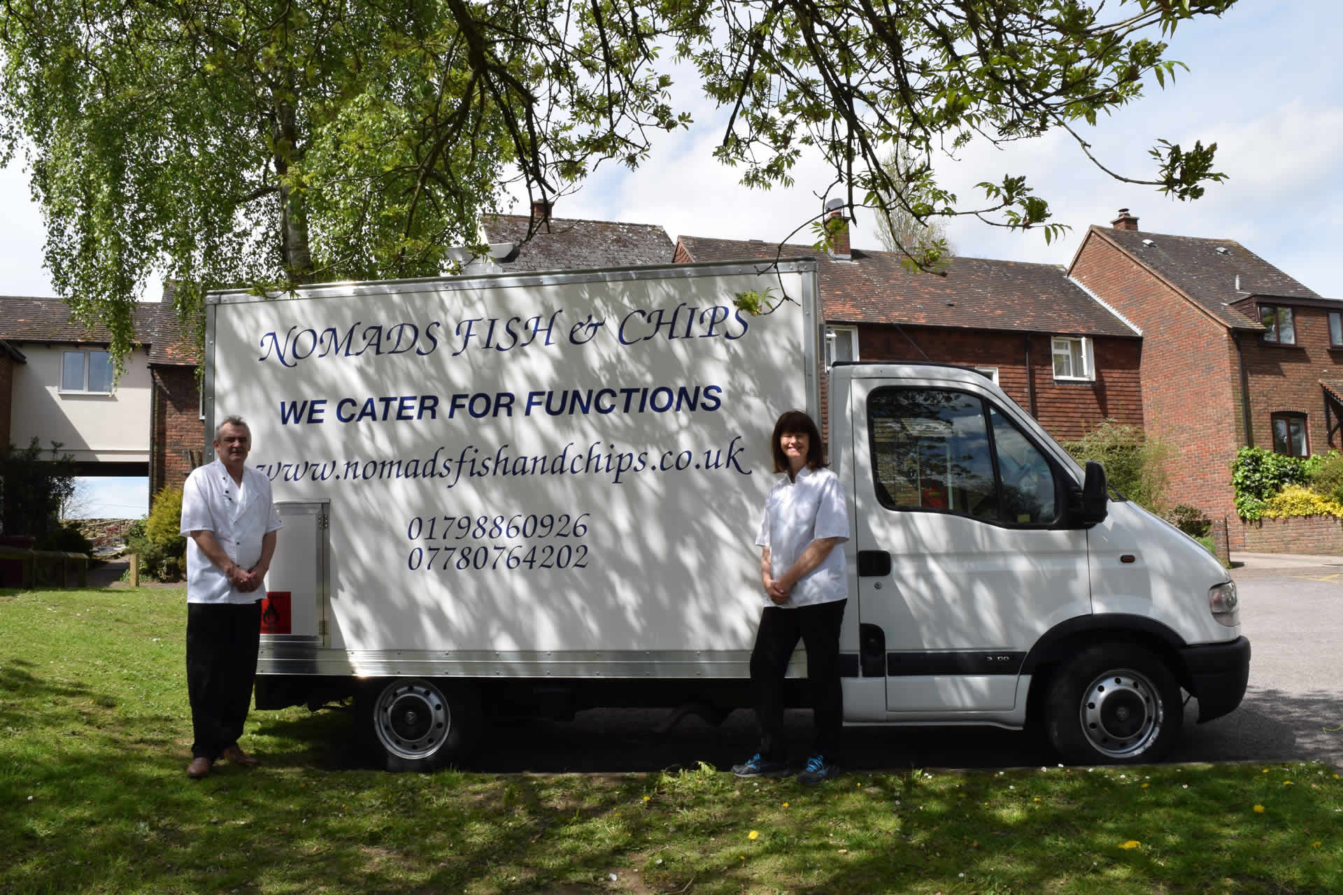 Customers waiting at the Nomads Fish and Chips van